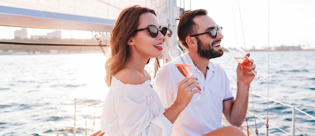 Couple enjoying one of our recommended date night ideas for new couples - the dinner cruise!